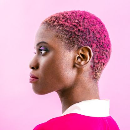 woman with short pink hair from using hair dye